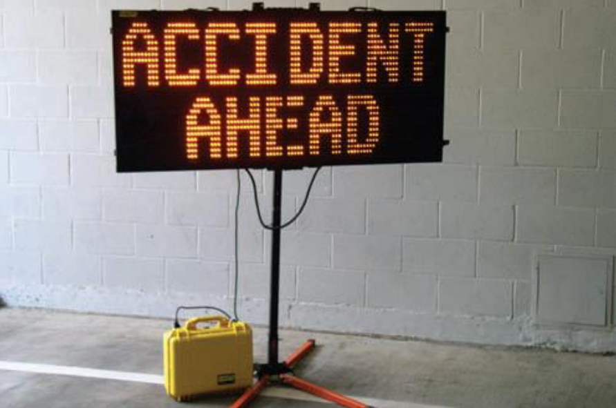 Image of sign reading accident ahead