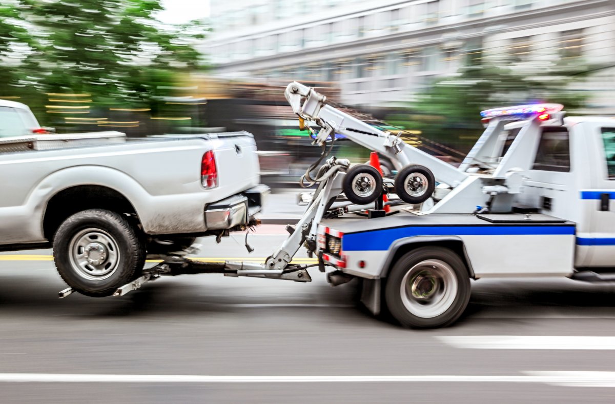 Tow truck towing a vehicle