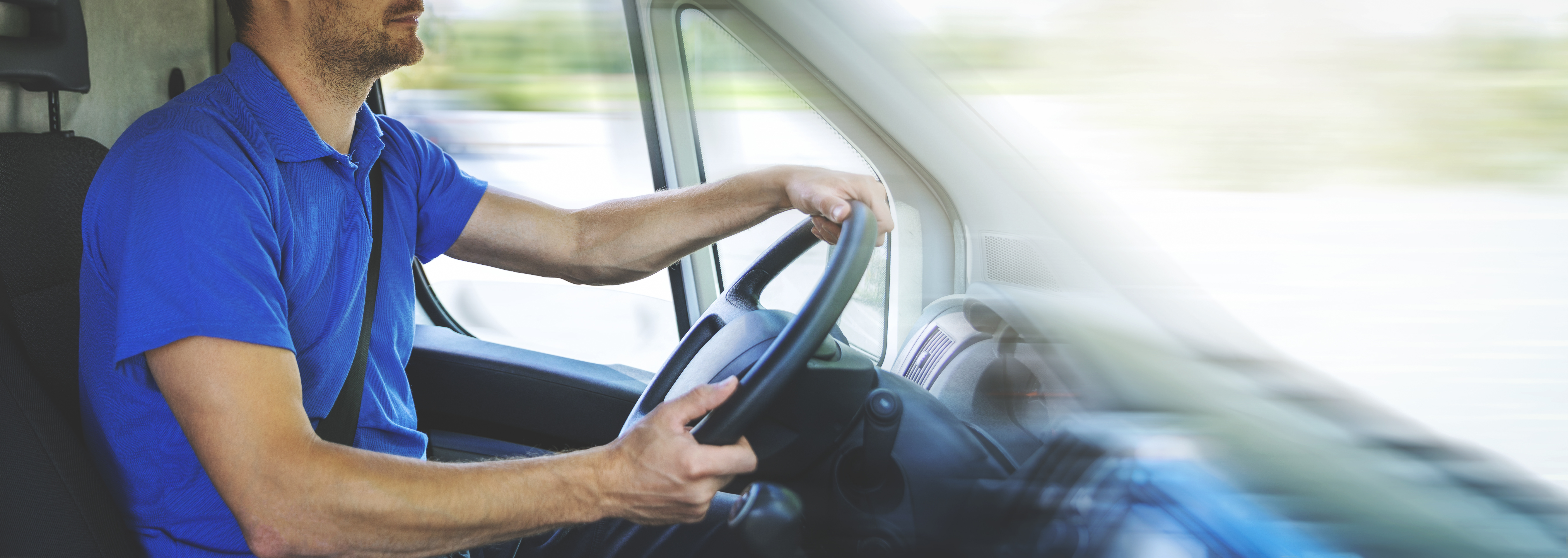 Truck Driver with hands on wheel 