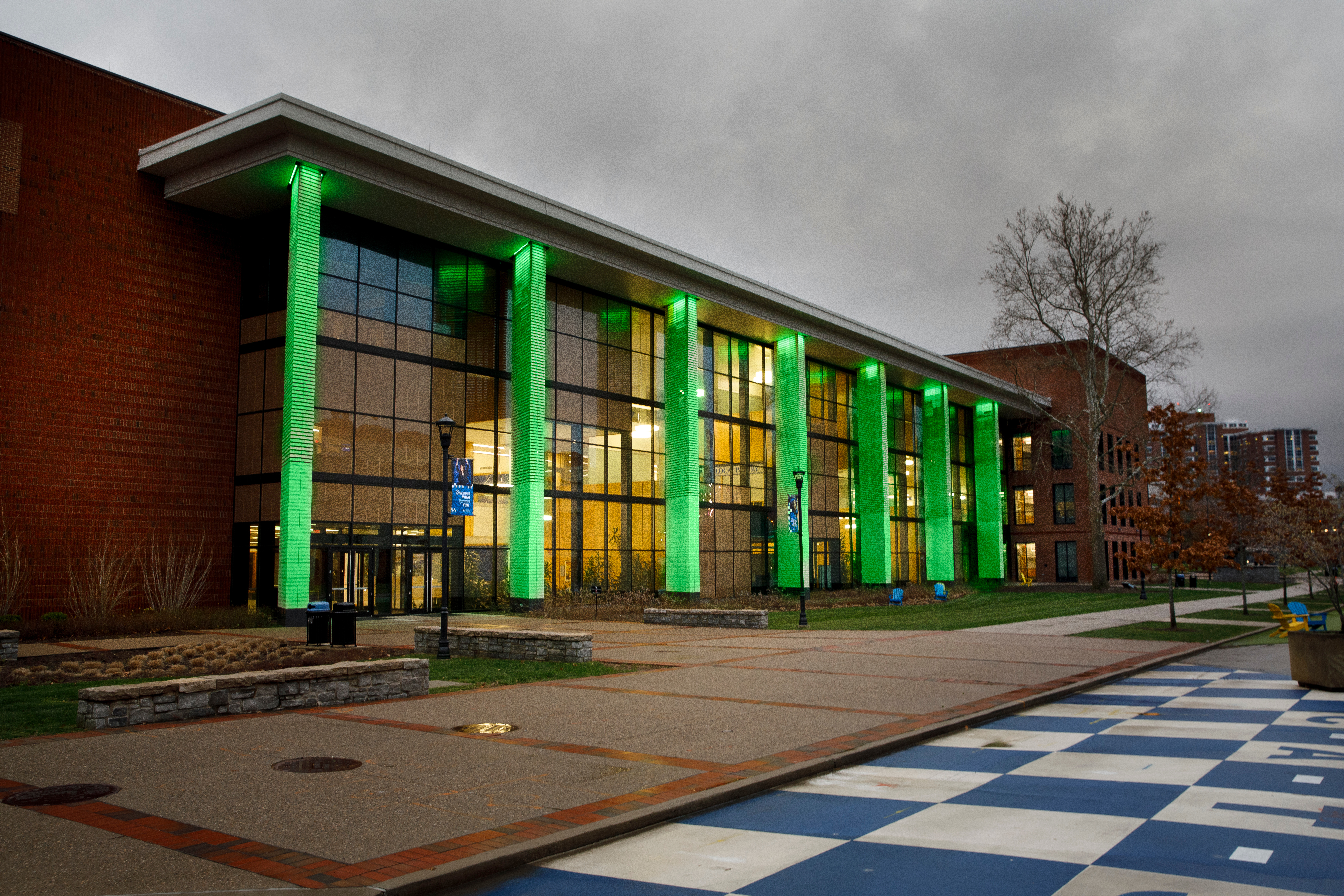 green lit up building