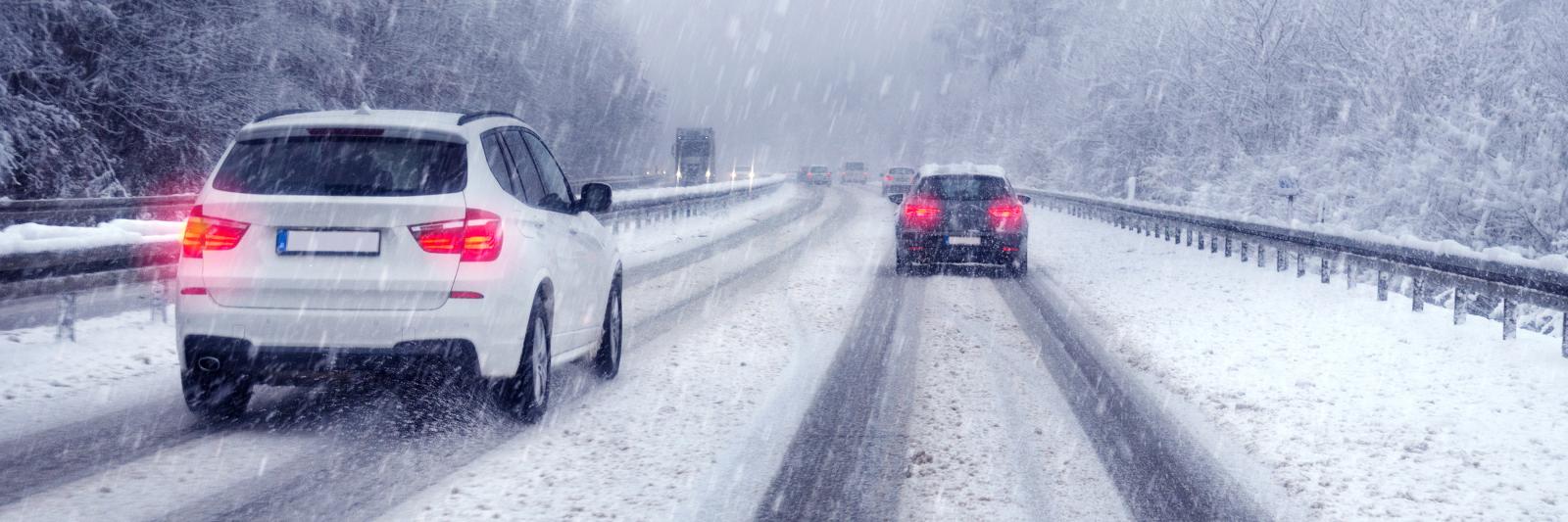 cars on a snow covered highway 