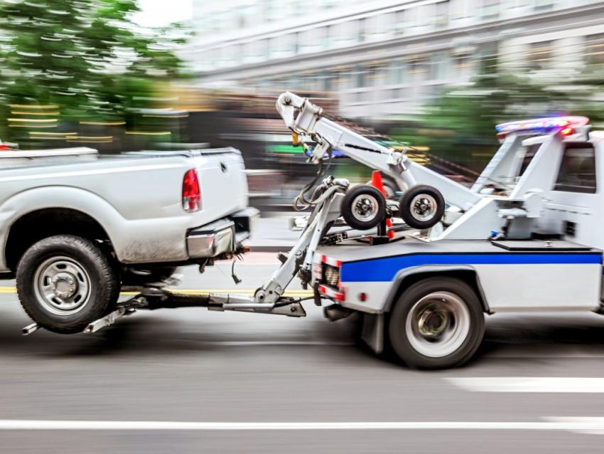 Tow truck towing a vehicle