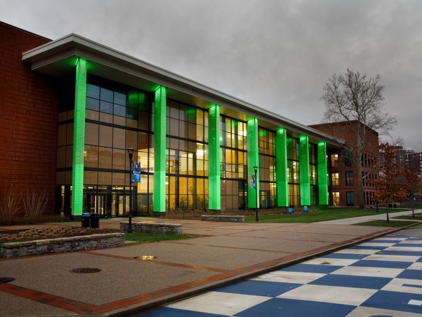 green lit up building