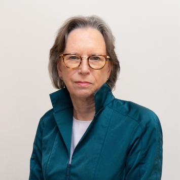 a profile photograph of Julia Costich